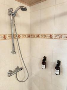 Koupelna v ubytování Pension FAULPELZ - Apartment mit Küche, Badewanne