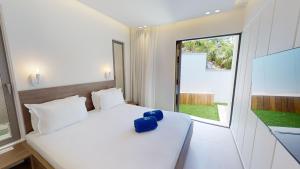 Ένα ή περισσότερα κρεβάτια σε δωμάτιο στο Flamands Loft +16 φωτογραφίες