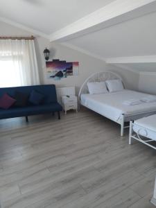 Postel nebo postele na pokoji v ubytování BEREN SUITE garden