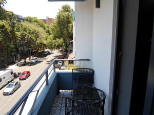 Un balcón o terraza en Alia Inn Boutique WTC
