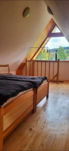 Posteľ alebo postele v izbe v ubytovaní Apartament Antonio