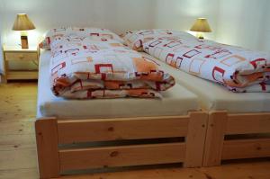 Ένα ή περισσότερα κρεβάτια σε δωμάτιο στο Apartments Rakoczi