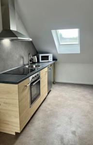 Kuchyň nebo kuchyňský kout v ubytování Ferien- Monteurwohnung 301 Diwo Dillingen