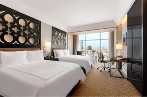 Rúm í herbergi á Hilton Lima Miraflores