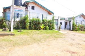 a building with a plant in front of it at Résidence Merveilles D20 in Kribi +43 photos