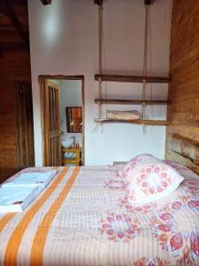 Postel nebo postele na pokoji v ubytování Hotel Areca