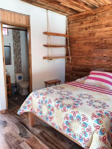 Postel nebo postele na pokoji v ubytování Hotel Areca