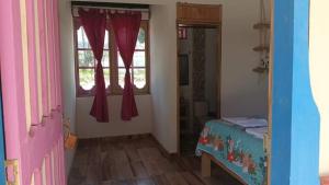Postel nebo postele na pokoji v ubytování Hotel Areca