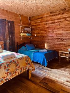 Postel nebo postele na pokoji v ubytování Hotel Areca