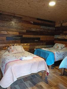 Postel nebo postele na pokoji v ubytování Hotel Areca