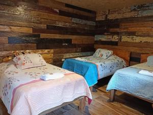 Postel nebo postele na pokoji v ubytování Hotel Areca