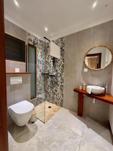 Ένα μπάνιο στο Green Lodge - Villa Standing Calme & Naturelle