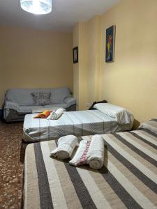 Postel nebo postele na pokoji v ubytování Carretón room