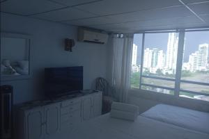 Кровать или кровати в номере Nuevo Conquistador piso 17