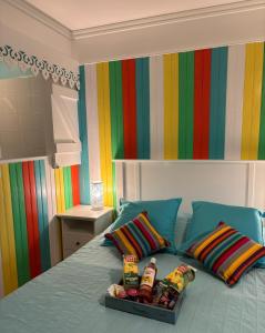 Llit o llits en una habitació de Couleur caraïbes-Ti créole appartement pierre et vacances accès plage et piscine