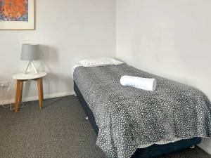 Unit 11 - Avoca Palms Resort客房内的一张或多张床位