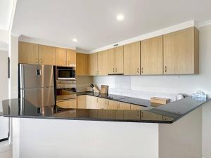 Unit 11 - Avoca Palms Resort的厨房或小厨房