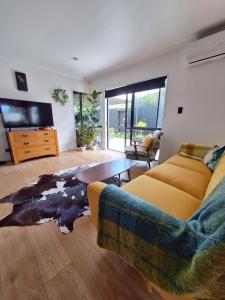 Χώρος καθιστικού στο Peaceful beachside oasis