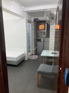 Katil atau katil-katil dalam bilik di Ajit guest house