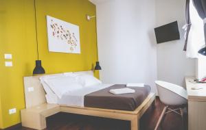 Postel nebo postele na pokoji v ubytování Bio Hotel Palermo