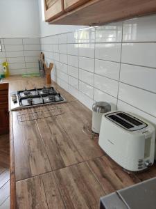 Kuchyň nebo kuchyňský kout v ubytování Coconut Bay Apartments