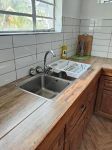 Kuchyň nebo kuchyňský kout v ubytování Coconut Bay Apartments