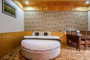 Χώρος καθιστικού στο Hotel Cherry Manali
