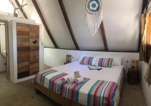 Postel nebo postele na pokoji v ubytování Kin Resort Lodge