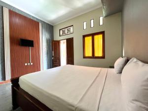 Voodi või voodid majutusasutuse Prabhu Suites toas +15 fotot