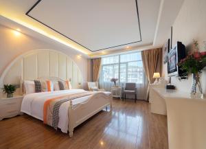 Fotografija u galeriji objekta 东玉楼大酒店Zhangjiajie Dong Yu Lou Hotel u gradu Džangđađe