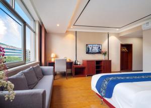TV a/nebo společenská místnost v ubytování 东玉楼大酒店Zhangjiajie Dong Yu Lou Hotel