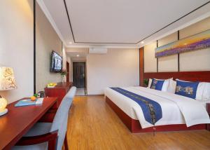 Fotografija u galeriji objekta 东玉楼大酒店Zhangjiajie Dong Yu Lou Hotel u gradu Džangđađe