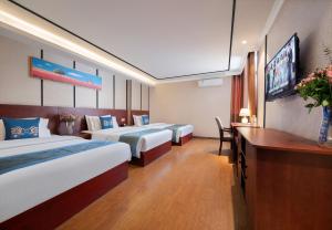 Fotografija u galeriji objekta 东玉楼大酒店Zhangjiajie Dong Yu Lou Hotel u gradu Džangđađe