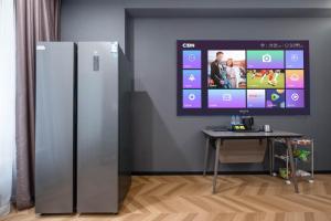 TV a/nebo společenská místnost v ubytování Yueta E-Sports Hotel-10min to Guangzhou East Railway Station&Entrance Exit J of Line 3