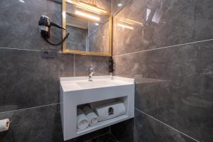 Koupelna v ubytování 216 Prestige Hotel