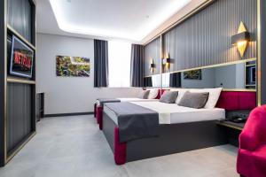 Postel nebo postele na pokoji v ubytování 216 Prestige Hotel