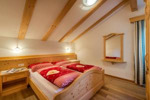 Postel nebo postele na pokoji v ubytování Appartamenti Maierhof