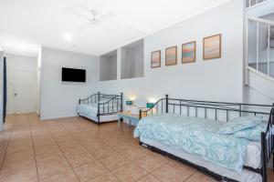 Voodi või voodid majutusasutuse Capricorn Views Yeppoon toas