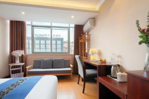 Fotografija u galeriji objekta 东玉楼大酒店Zhangjiajie Dong Yu Lou Hotel u gradu Džangđađe