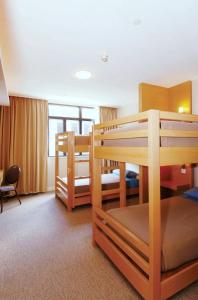 Letto o letti in una camera di The Salisbury - YMCA of Hong Kong