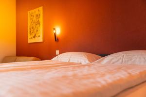 Voodi või voodid majutusasutuse Jura Sport & Spa Resort toas
