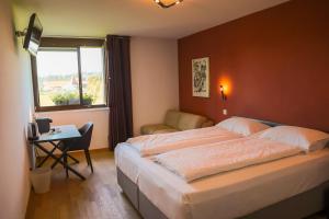 Voodi või voodid majutusasutuse Jura Sport & Spa Resort toas
