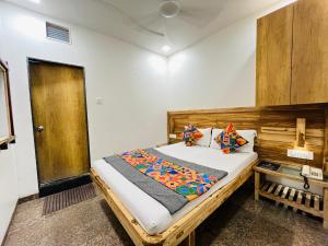 Postel nebo postele na pokoji v ubytování Hotel Regency
