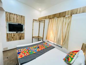 Postel nebo postele na pokoji v ubytování Hotel Regency