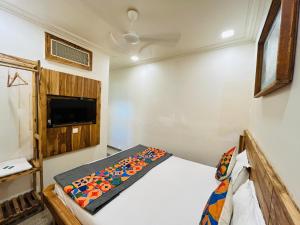 TV a/nebo společenská místnost v ubytování Hotel Regency