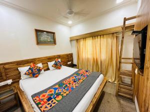 Postel nebo postele na pokoji v ubytování Hotel Regency