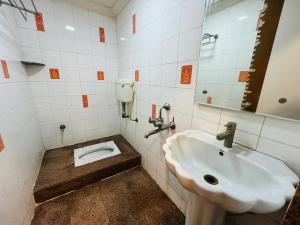 Koupelna v ubytování Hotel Regency