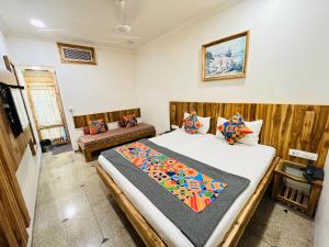 Postel nebo postele na pokoji v ubytování Hotel Regency