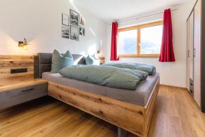 Postelja oz. postelje v sobi nastanitve Appart Zellblick
