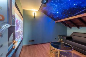 TV a/nebo společenská místnost v ubytování Qingdao Badaguan Jingli Villa Hotel + 39 fotografií